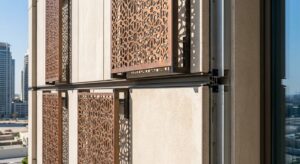 Prefabricated ventilated facade with shading screens used in sustainable prefab construction in Dubai